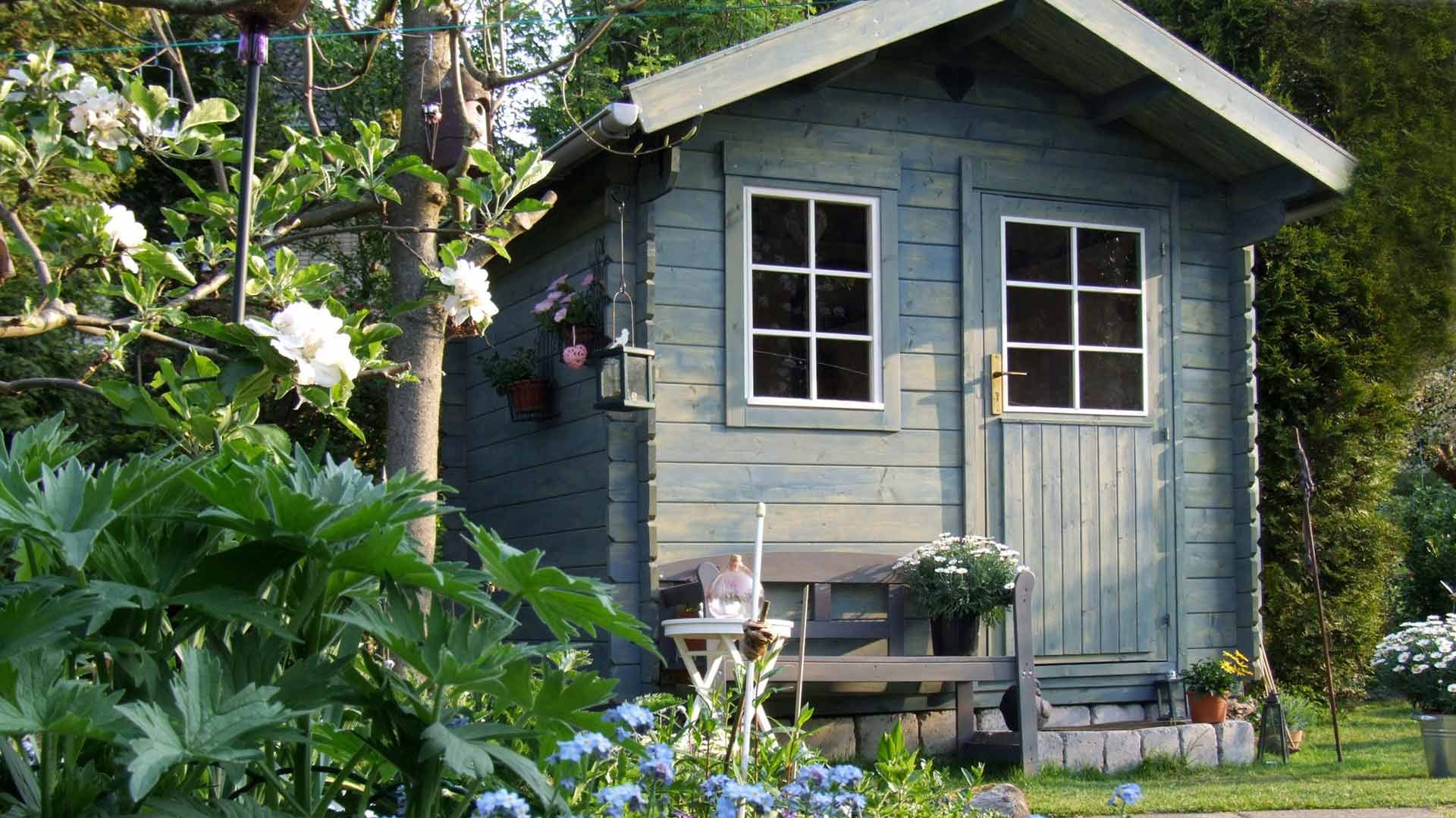 blaues Gartenhaus aus Holz blaues Gartenhaus aus Holz